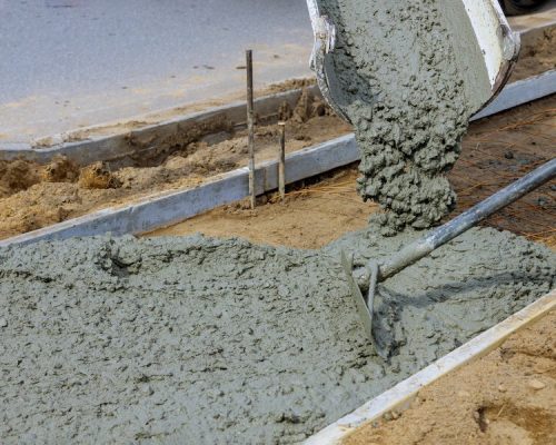 cement-front-sidewalk-new-building-construction-worker-concrete-surface-new-sidewalk_73110-9184